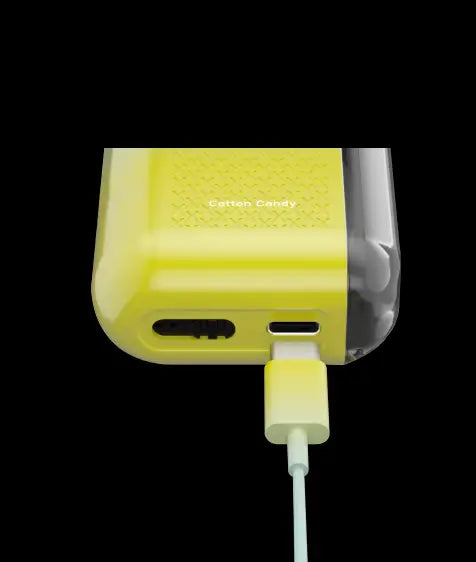 Close-up of yellow charging case with cable