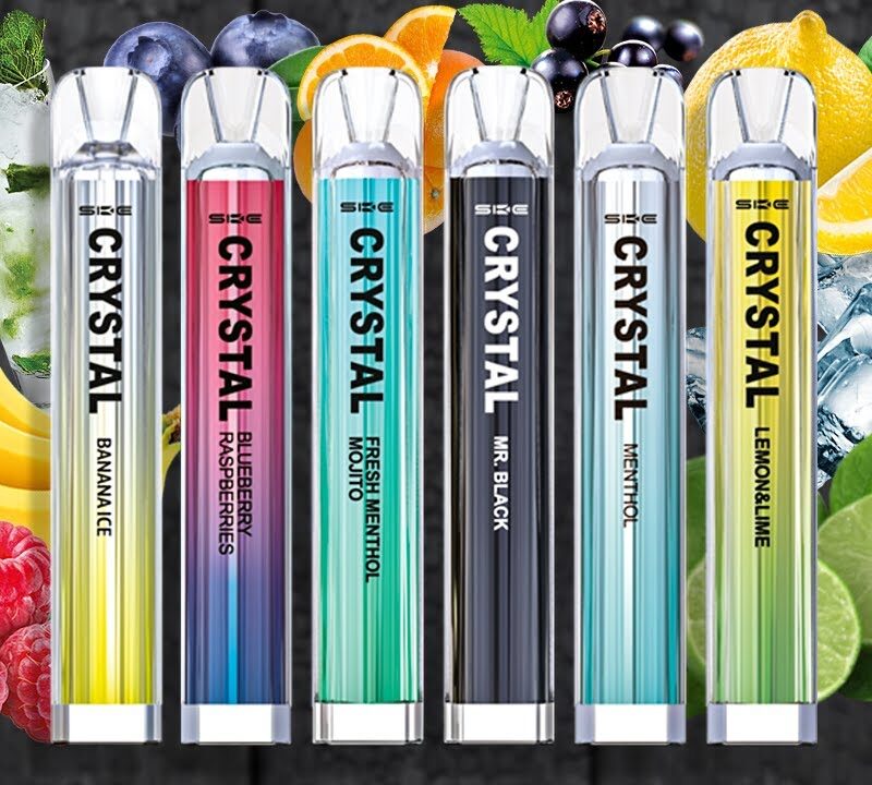 Various flavored vape pens on colorful background