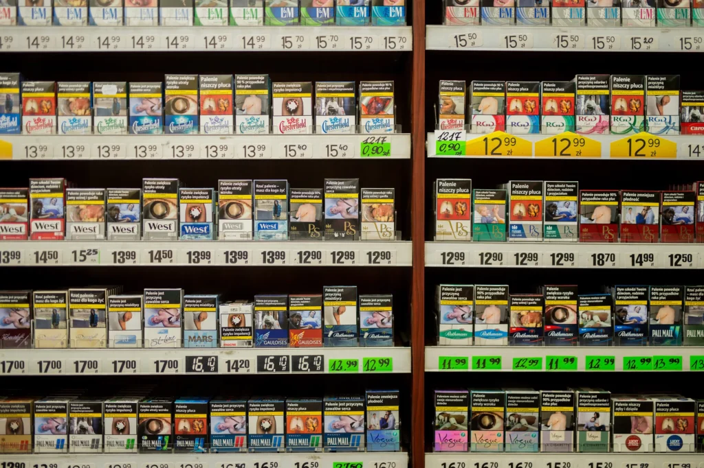 Display of various cigarette brands on shelves