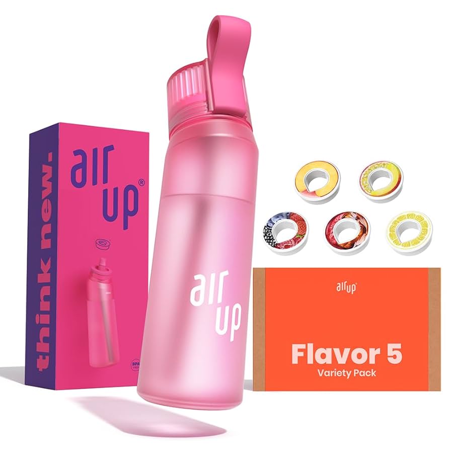 Butelka z liquidem pod strumieniem ciepłej wody.