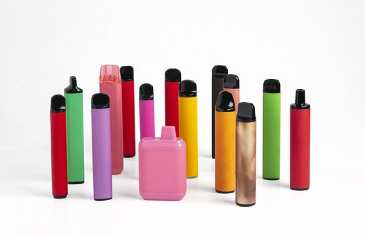 Colorful vape devices on a white background.