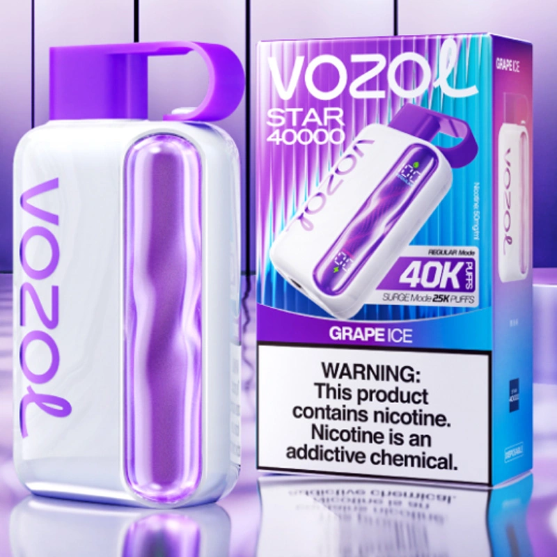 Kompozycja e-papierosów Vozol otoczonych świeżymi, soczystymi owocami, z kroplami wody, podkreślająca naturalność i orzeźwienie