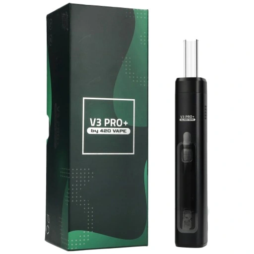 Waporyzator ziołowy w użyciu, z widocznym suszem ziołowym obok i delikatną chmurką pary.