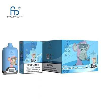 E-papieros jednorazowy Fumot Digital Box leżący dyskretnie na biurku obok laptopa w środowisku biurowym, podkreślający jego profesjonalny wygląd.