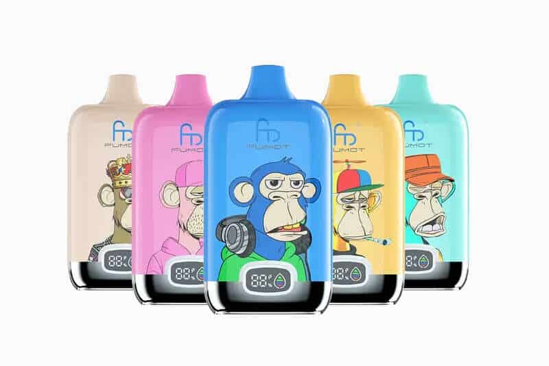 E-papieros Fumot Digital Box w kształcie małego pudełeczka z zaokrąglonymi rogami, w pastelowym kolorze, leżący w otwartej kobiecej dłoni.